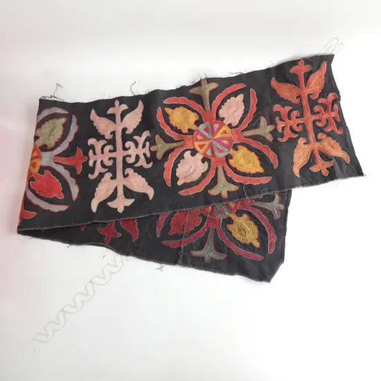 A Kyrgyzstani embroidered suzani runner. 1420 x 320mm.